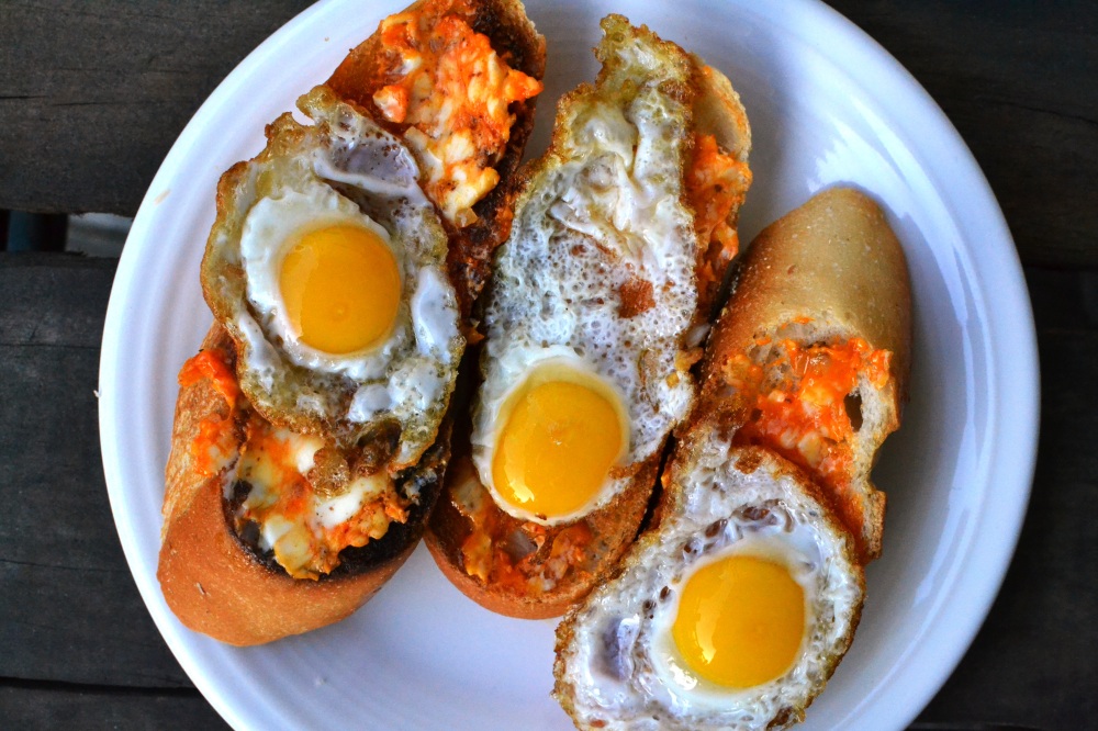 Crostinis with Chili Butter and Fried Quail Eggs